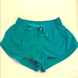 Size 4 green viridian lululemon hotty hot shorts